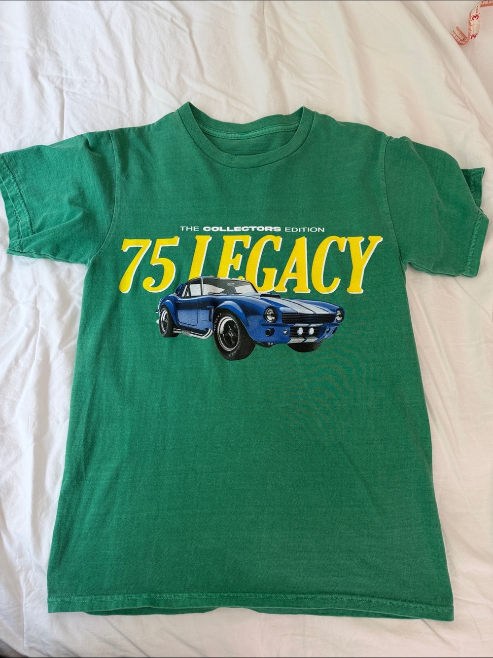 Green '75 Legacy' Graphic Tee with Blue Car Illustration